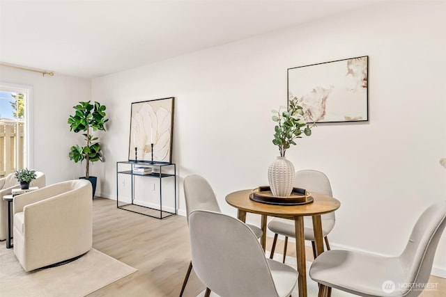 502 141st Ave SE Unit 45, Bellevue, WA 98007 - dining room featuring light wood finished floors and baseboards