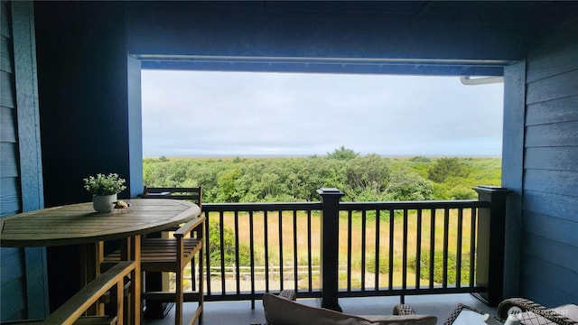 835 Ocean Shores Blvd NW Unit 305, Ocean Shores, WA 98569 - balcony with a wooded view