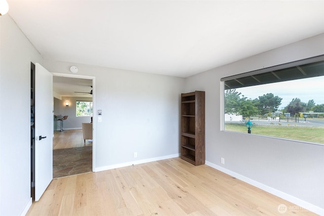 110 Victoria View St, Sequim, WA 98382 - empty room with light wood finished floors and a smoke detector