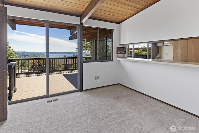 21030 6th Ave S, Des Moines, WA 98198 - unfurnished sunroom featuring a water view and a sink