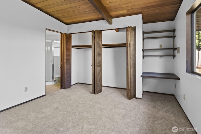 21030 6th Ave S, Des Moines, WA 98198 - unfurnished bedroom featuring a wooden ceiling with exposed beams, carpet, and ensuite bathroom
