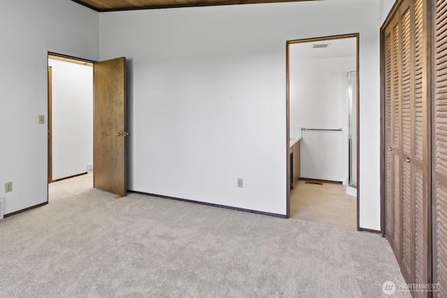 21030 6th Ave S, Des Moines, WA 98198 - unfurnished bedroom with carpet floors and a closet