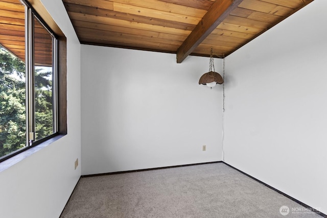 21030 6th Ave S, Des Moines, WA 98198 - empty room featuring a wooden ceiling with exposed beams and carpet flooring