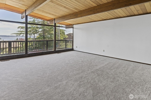 21030 6th Ave S, Des Moines, WA 98198 - unfurnished sunroom featuring beamed ceiling and a water view