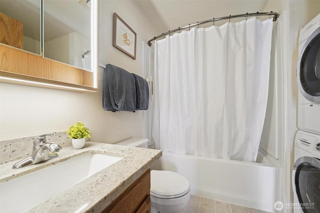 27523 SW Sandy Shores Dr, Vashon, WA 98070 - full bath with stacked washing machine and dryer, vanity, and shower / bath combination with curtain
