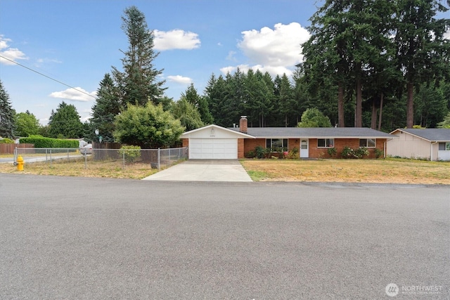 2598 25th Loop SE, Lacey, WA 98503 - ranch-style home featuring driveway, a garage, and a chimney