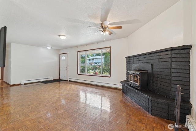 2598 25th Loop SE, Lacey, WA 98503 - unfurnished living room with baseboard heating, a textured ceiling, a ceiling fan, and a baseboard radiator
