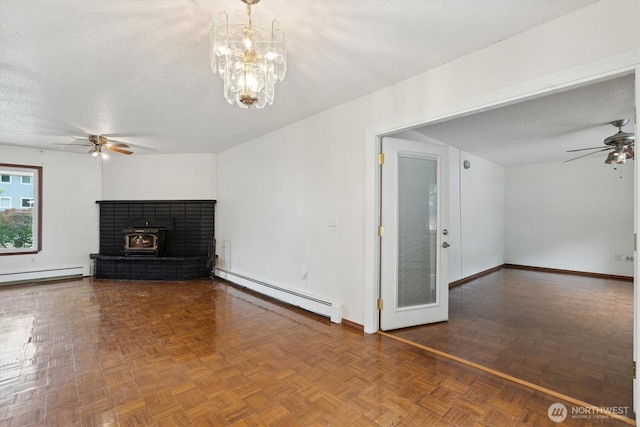 2598 25th Loop SE, Lacey, WA 98503 - unfurnished living room with baseboard heating, a ceiling fan, a chandelier, and a textured ceiling