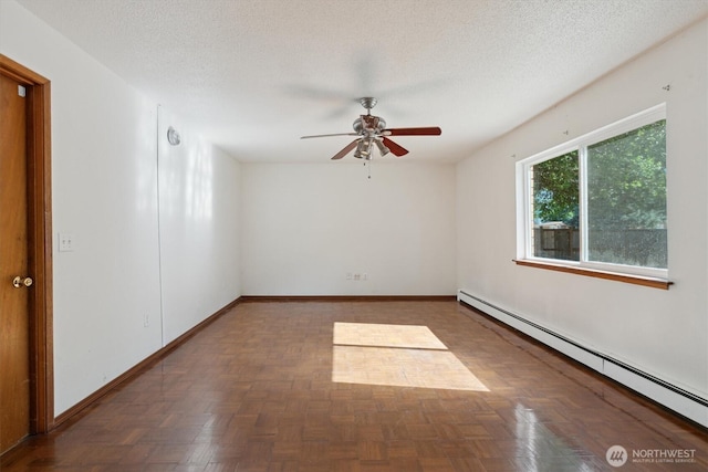 2598 25th Loop SE, Lacey, WA 98503 - empty room with baseboard heating, a ceiling fan, and a textured ceiling