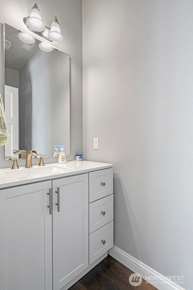 1326 SW 340th St, Federal Way, WA 98023 - bathroom featuring vanity and wood finished floors