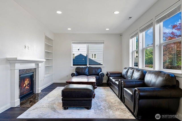 1326 SW 340th St, Federal Way, WA 98023 - living area with built in features, recessed lighting, dark wood finished floors, and a high end fireplace
