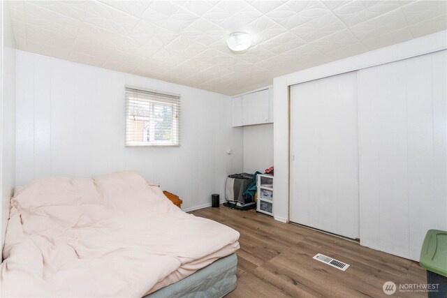 5920 200th St SW Unit 37, Lynnwood, WA 98038 - bedroom featuring wood finished floors and a closet