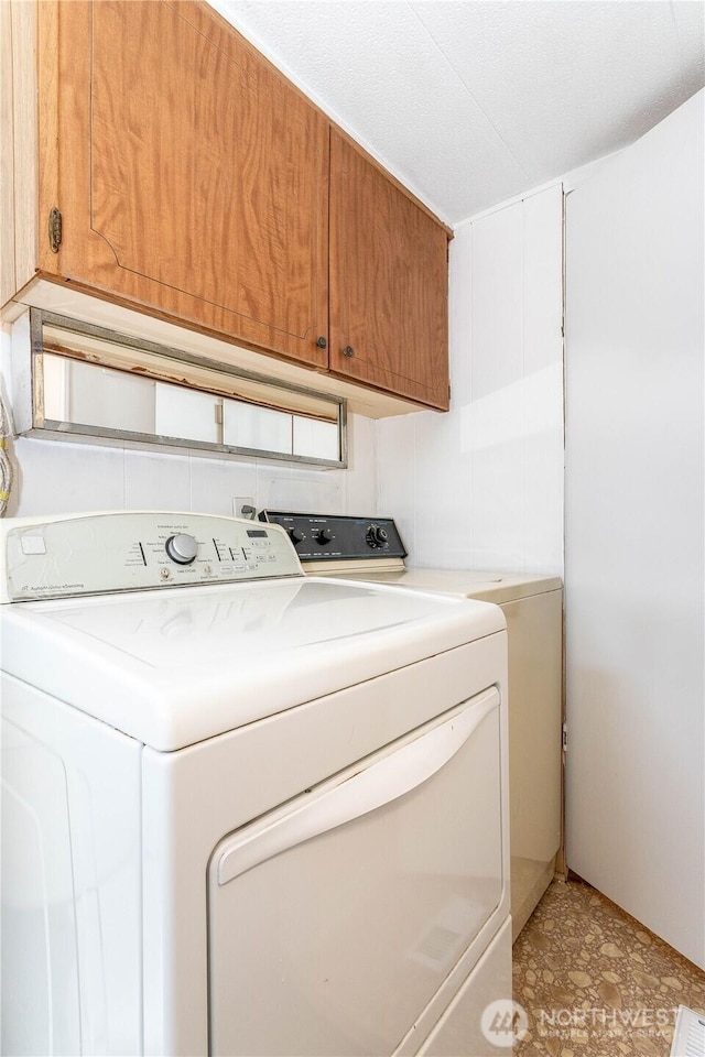 5920 200th St SW Unit 37, Lynnwood, WA 98038 - laundry room featuring cabinet space and washer and clothes dryer