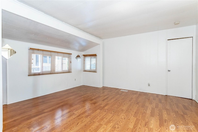 5920 200th St SW Unit 37, Lynnwood, WA 98038 - empty room featuring wood finished floors and vaulted ceiling