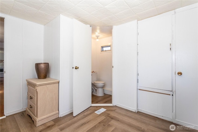 5920 200th St SW Unit 37, Lynnwood, WA 98038 - bathroom featuring toilet and wood finished floors