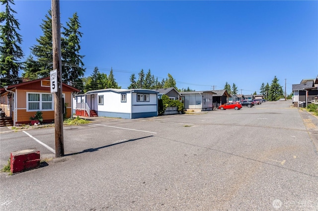 5920 200th St SW Unit 37, Lynnwood, WA 98038 - view of front facade with a residential view and uncovered parking