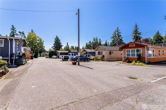 5920 200th St SW Unit 37, Lynnwood, WA 98038 - view of asphalt street with street lighting