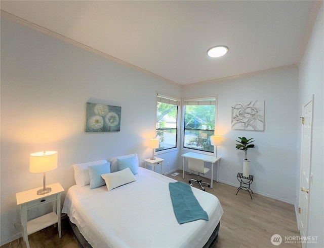 1711 159th Pl NE Unit 29, Bellevue, WA 98008 - bedroom featuring wood finished floors and baseboards