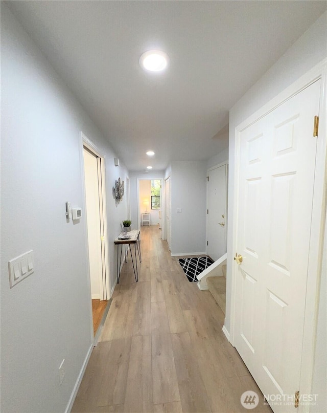 1711 159th Pl NE Unit 29, Bellevue, WA 98008 - hallway featuring light wood-style flooring and recessed lighting