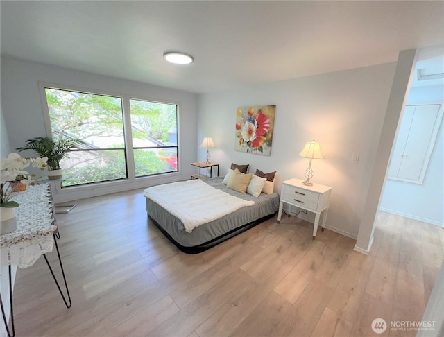 1711 159th Pl NE Unit 29, Bellevue, WA 98008 - bedroom with light wood finished floors and baseboards