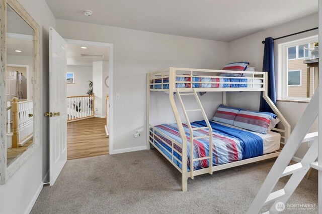 6926 Holeman Ave, Blaine, WA 98230 - carpeted bedroom featuring baseboards