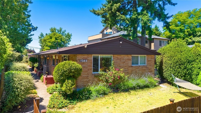 7343 35th SW, Seattle, WA 98126 - view of side of property featuring brick siding