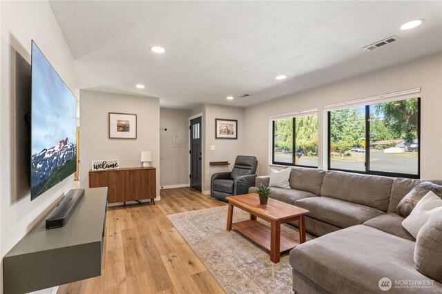 4502 223rd St SW, Mountlake Terrace, WA 98043 - living room with light wood-type flooring and recessed lighting