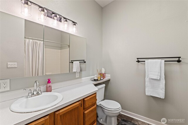 4502 223rd St SW, Mountlake Terrace, WA 98043 - bathroom with vanity and curtained shower