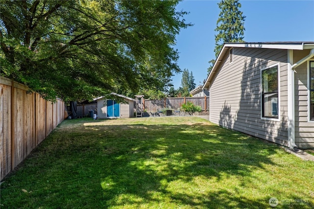 4502 223rd St SW, Mountlake Terrace, WA 98043 - fenced backyard with a storage unit