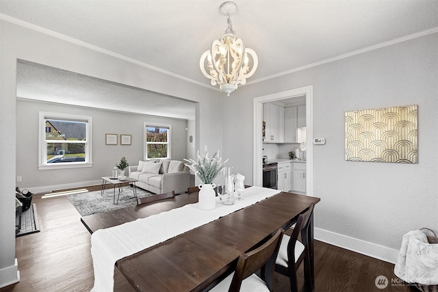 213 S 58th St, Tacoma, WA 98408 - dining room featuring a chandelier, crown molding, and dark wood-style floors