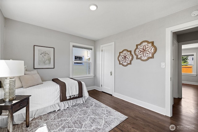 213 S 58th St, Tacoma, WA 98408 - bedroom featuring baseboards and dark wood-style floors