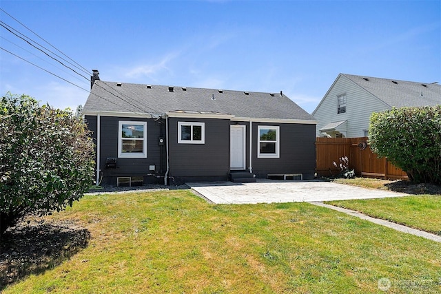 213 S 58th St, Tacoma, WA 98408 - back of property with a patio area, entry steps, a chimney, and a shingled roof