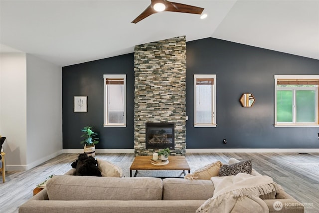 49 Cascade Ln, Bellingham, WA 98229 - living room with ceiling fan, lofted ceiling, a large fireplace, and wood finished floors