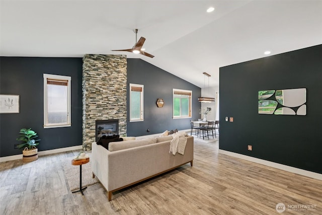 49 Cascade Ln, Bellingham, WA 98229 - living room featuring light wood-style flooring, a ceiling fan, lofted ceiling, and a fireplace