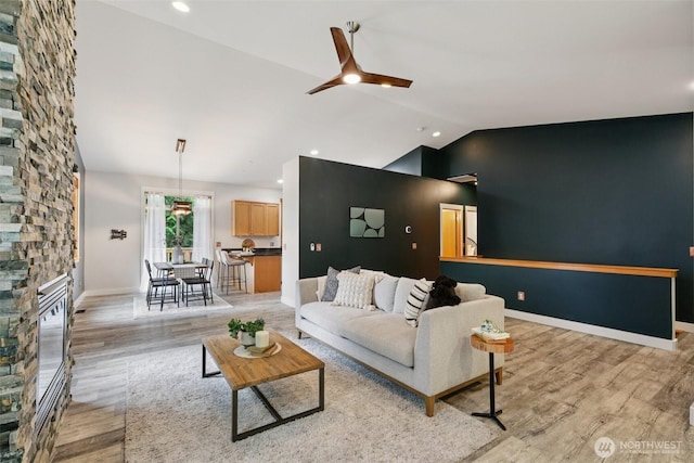 49 Cascade Ln, Bellingham, WA 98229 - living room with ceiling fan, lofted ceiling, a fireplace, light wood finished floors, and recessed lighting