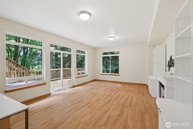 49 Cascade Ln, Bellingham, WA 98229 - unfurnished living room with light wood-style flooring and baseboards