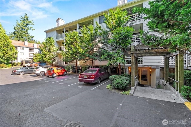 700 N 160th St Unit A316, Shoreline, WA 98133 - view of apartment building / complex with uncovered parking