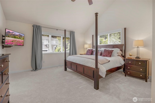 7709 NE 170th St, Kenmore, WA 98028 - bedroom with multiple windows, vaulted ceiling, light carpet, and a ceiling fan