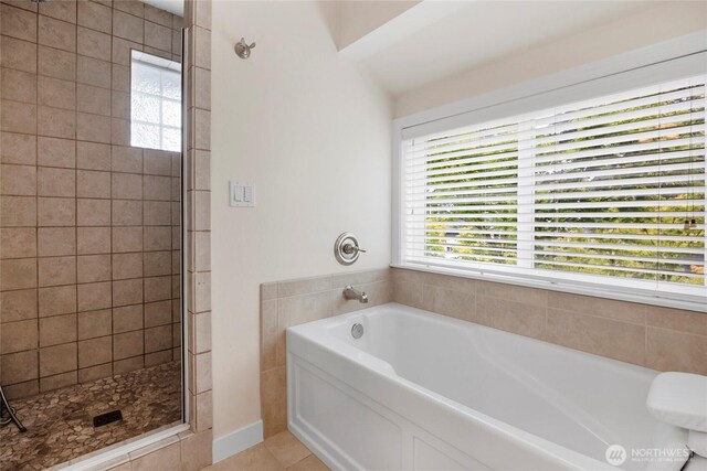 7709 NE 170th St, Kenmore, WA 98028 - full bathroom featuring a garden tub, a tile shower, and tile patterned flooring