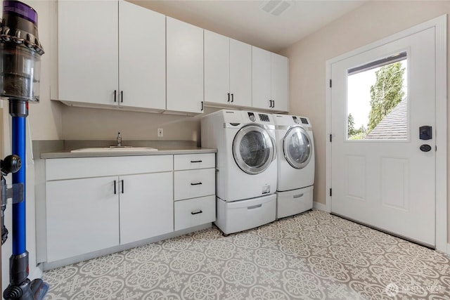 7709 NE 170th St, Kenmore, WA 98028 - washroom featuring cabinet space and washing machine and clothes dryer