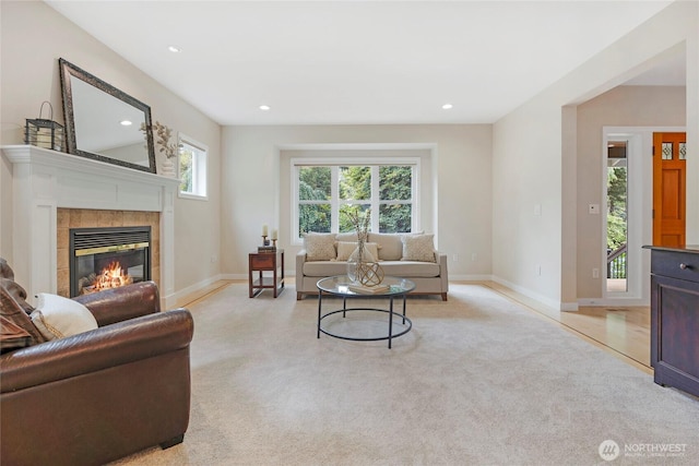 7709 NE 170th St, Kenmore, WA 98028 - living room featuring light carpet, a tile fireplace, and recessed lighting