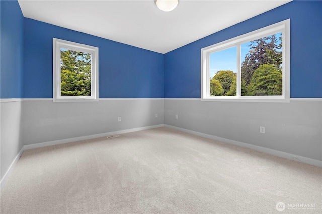 7709 NE 170th St, Kenmore, WA 98028 - carpeted spare room featuring baseboards