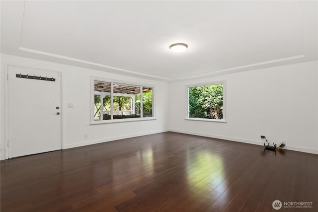 1308 S 359th St, Federal Way, WA 98003 - spare room featuring baseboards and dark wood finished floors