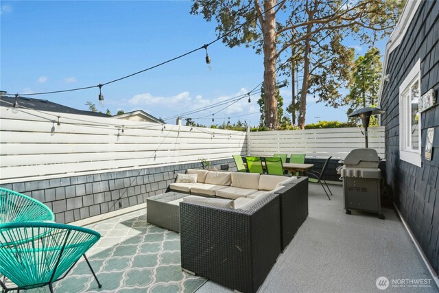 7826 SE 24th St, Mercer Island, WA 98040 - fenced backyard featuring a grill, outdoor lounge area, and a patio area