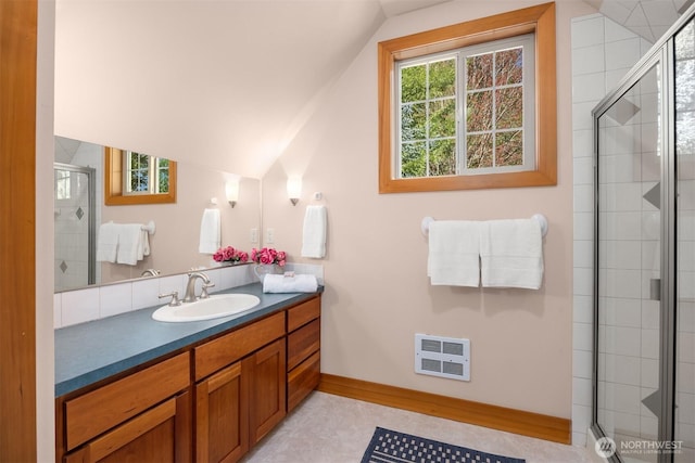 3969 Palomino Dr NE, Bainbridge Island, WA 98110 - bathroom featuring lofted ceiling, vanity, a shower stall, and heating unit