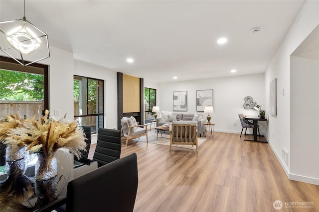 10305 NE 16th St Unit I6, Bellevue, WA 98004 - living area featuring light wood-style floors and recessed lighting