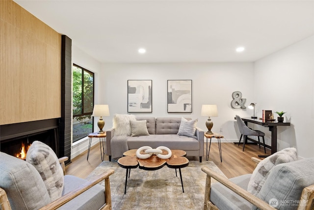 10305 NE 16th St Unit I6, Bellevue, WA 98004 - living area featuring light wood-style flooring, recessed lighting, and a fireplace