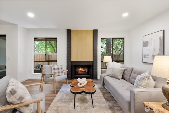 10305 NE 16th St Unit I6, Bellevue, WA 98004 - living room featuring wood finished floors, plenty of natural light, recessed lighting, and a fireplace
