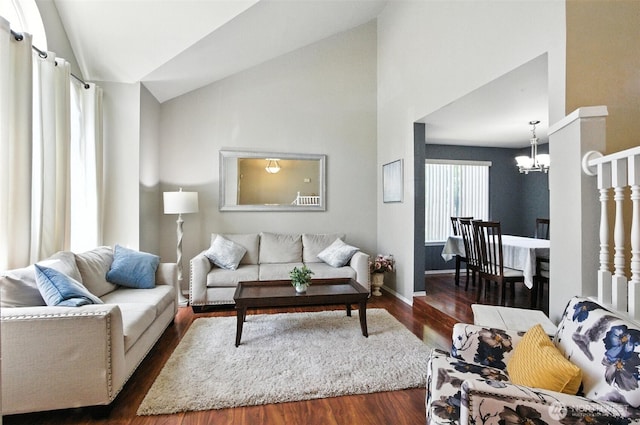37404 18th Ave S, Federal Way, WA 98003 - living room featuring lofted ceiling, a chandelier, and dark wood-style floors
