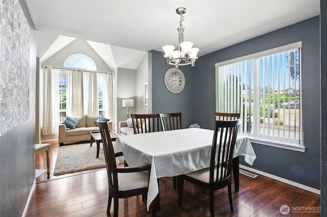 37404 18th Ave S, Federal Way, WA 98003 - dining room featuring wood-type flooring, a chandelier, and lofted ceiling